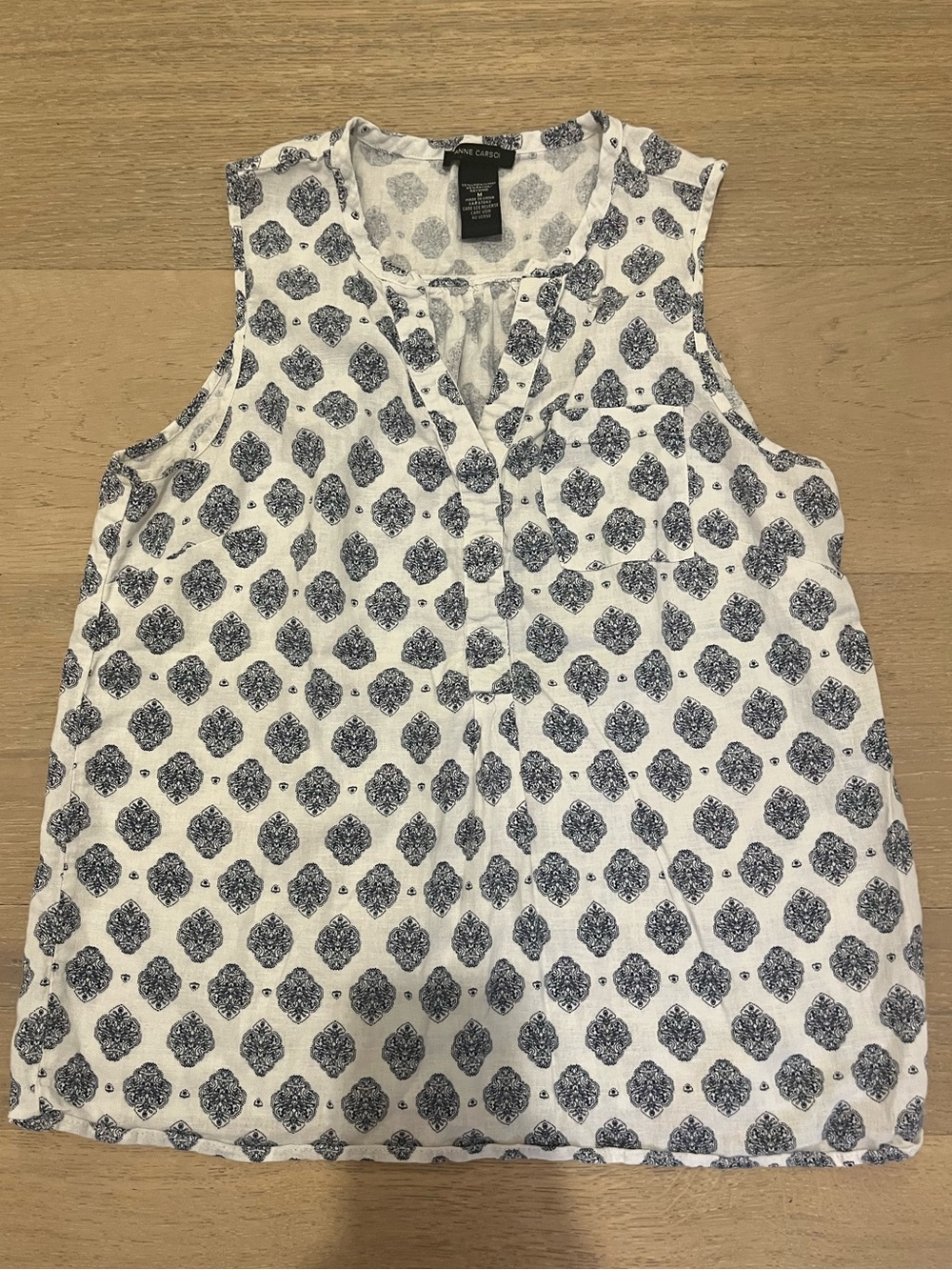 White Sleeveless Blouse